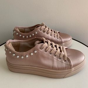 pink sneakers with pearls